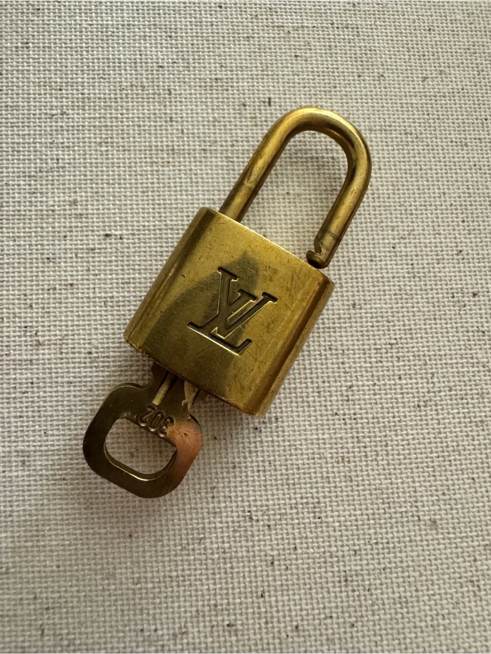 Louis Vuitton Gold Padlock with Key - AUTHENTIC